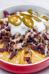 Wall Mural - nachos baked with mince beef meat, cheese and red beans