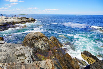 Wall Mural - Atlantic ocean waves and rock beach along coastline in Portland, Maine, USA