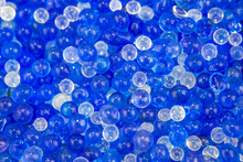 Silica Gel. Water Blue Gel Balls. Polymer Gel. Silica Gel. Balls Of The Blue Hydrogel. Crystal Liquid Ball With Reflection. Texture Background. Close Up Macro. 