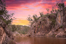 Pink Sunset Sky At Crows Nest Falls In Queensland, Australia In The Natural Bush Area. 