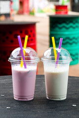 Sticker - two milkshakes with banana and strawberry, vanilla milkshakes