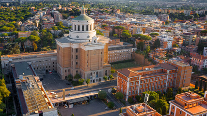 Wall Mural - Aerial view of the church of Santa Maria Regina degli Apostoli in Montagnola. The parish is located in Rome, Italy, in the Ostiense district.