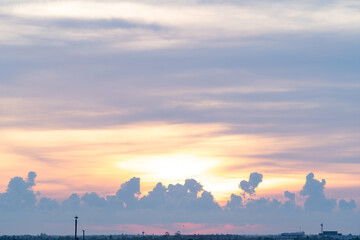 Wall Mural - Colorful clouds and blue sky with the sunset for nature textured background