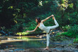 © Sergei - European girl doing yoga and walking in nature.