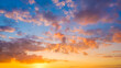 Sky with clouds during sunset. Clouds and blue sky. Panoramic photo for design and background.