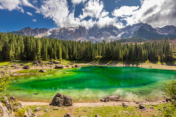 Wall Mural - majestic aerial view of carezza lake in dolomites