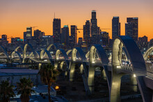 New 6th Street Bridge In Los Angeles At Sunset With The Los Angles Skyline In The Distance