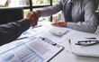 © crizzystudio - Two confident executive business shaking hands during a meeting to deal with complete agreement contract and become a business join venture success creativity ideas concept