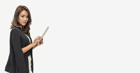 Young Asian woman using digital tablet isolated background.