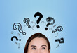 © ImageFlow - Businesswoman with inspired look, eyes up, set of question marks