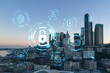 © VideoFlow - Seattle aerial skyline panorama of downtown skyscrapers at sunset, Washington USA. The concept of cyber security to protect confidential information, padlock hologram