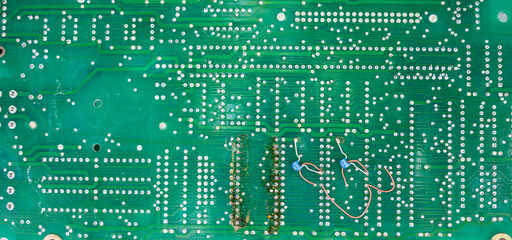 Poster - Old computer chips that are out of order. Not working microshops with transistors, chips and conductors. Blue system board with microchips and transistors