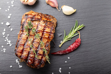 Wall Mural - Fresh delicious juicy steak with vegetables and spices