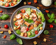 Salmon Caesar salad with grilled fish, croutons and cherry tomatoes