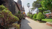 Little Girl Traveler Is Walking In The Ruin Of Ayutthaya, Thailand