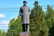 Monument To Vladimir Lenin Against The Blue Sky