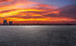 Empty asphalt road ground and modern city skyline with colorful sky clouds at sunset in Suzhou, China. high angle view.