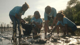 Fototapeta Paryż - Group of volunteers cleaning on the beach