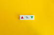 © photoopus - Interest Rate Concept. Red Arrow, Percentage Sign, and Green Arrow on Block Letter Tiles on Yellow Background. Minimal Aesthetics.