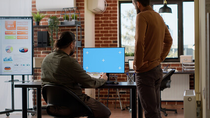 Poster - Business people brainstorming ideas in front of greenscreen monitor, doing teamwork job with chroma key display. Working on computer with isolated blank copyspace and mockup template.