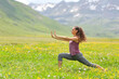 © Antonioguillem - Woman practicing tai chi in a high mountain field