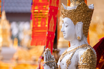 Asia Angel Statue in front of Tung Tree, Traditional Believe of the Victory and Brightness in that area, Wat Phra That Doi Tung, Famous Place in North of Thailand.