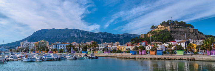 Canvas Print - Denia Spain panoramic view castle Alicante with colourful houses and mountain and beautiful blue sky