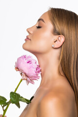 Wall Mural - Beauty face of the young beautiful woman with flower on white background