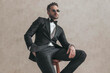 © Viorel Sima - bearded young groom with hand in pocket posing and being confident