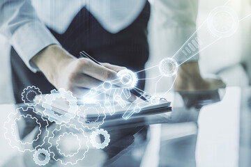 Aufkleber - Double exposure of robotics technology hologram and man hand writing in notebook on background. Research and development software concept