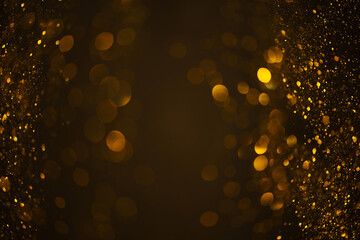 golden glitter shiny particles lights abstract swirly bokeh dark background