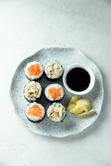 Wall Mural - Healthy sushi rolls with salmon and eel