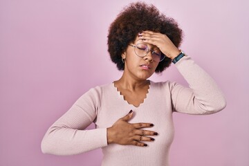 Sticker - Young african american woman standing over pink background touching forehead for illness and fever, flu and cold, virus sick