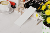Fototapeta  - Paper bookmark at workplace mockup. 3D rendering