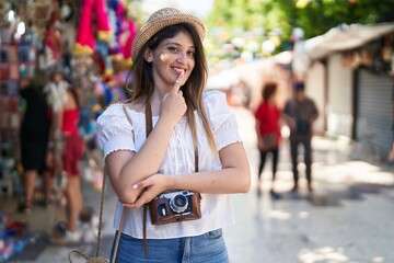 Sticker - Young brunette woman on summer vacation smiling looking confident at the camera with crossed arms and hand on chin. thinking positive.