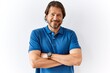 © Krakenimages.com - Handsome middle age man standing together over isolated background happy face smiling with crossed arms looking at the camera. positive person.