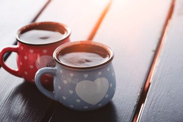 Two cups of coffee on wooden background Copyspace