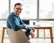 © Moon Safari - Portrait of young smiling happy handsome successful businessman entrepreneur freelancer working looking back.