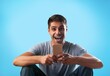 © BillionPhotos.com - Joyful guy holding modern smartphone, looking at gadget screen, online, texting girlfriend