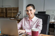 © ADDICTIVE STOCK - Joyful woman with coffee typing on laptop
