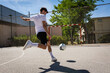 © ADDICTIVE STOCK - Full body Of Young Man Playing Soccer