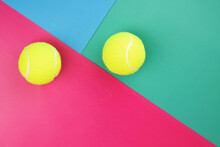 Two Tennis Balls On Colorful Background