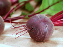 Fresh Picked Beetroot With Leaves On Wooden Background, Close Up Of Red Root Vegetable