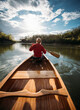 © yossarian6 - Woman paddling canoe on the lake