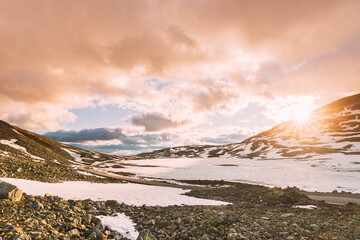 Canvas Print - Aurlandsfjellet, Norway. Sunset Sky Above Road Aurlandsfjellet. Scenic Route Road In Summer Norwegian Landscape. Natural Norwegian Landmark And Popular Destination.