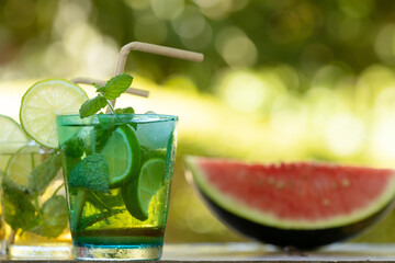 Wall Mural - glass of mojito, tropical drink with mint and brown sugar