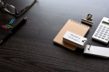 Leinwandbilder - There is word card with the word Marketing Automation on the desk.