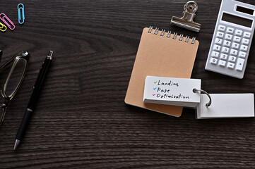 Leinwandbilder - There is word card with the word Landing Page Optimization on the desk.