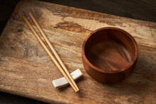 Empty Asian Wooden Bowl And Chopsticks