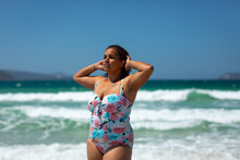 Curvy Model Posing In Swimsuit At Beach